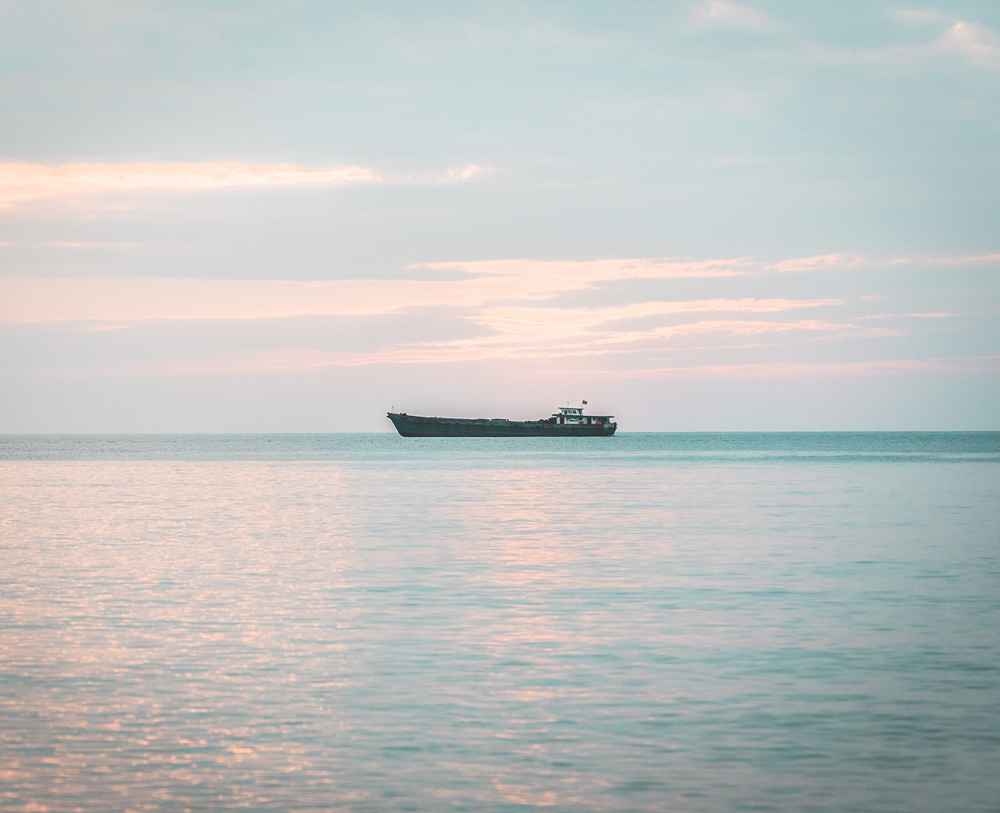 Landscape image of a boat in Vietnam